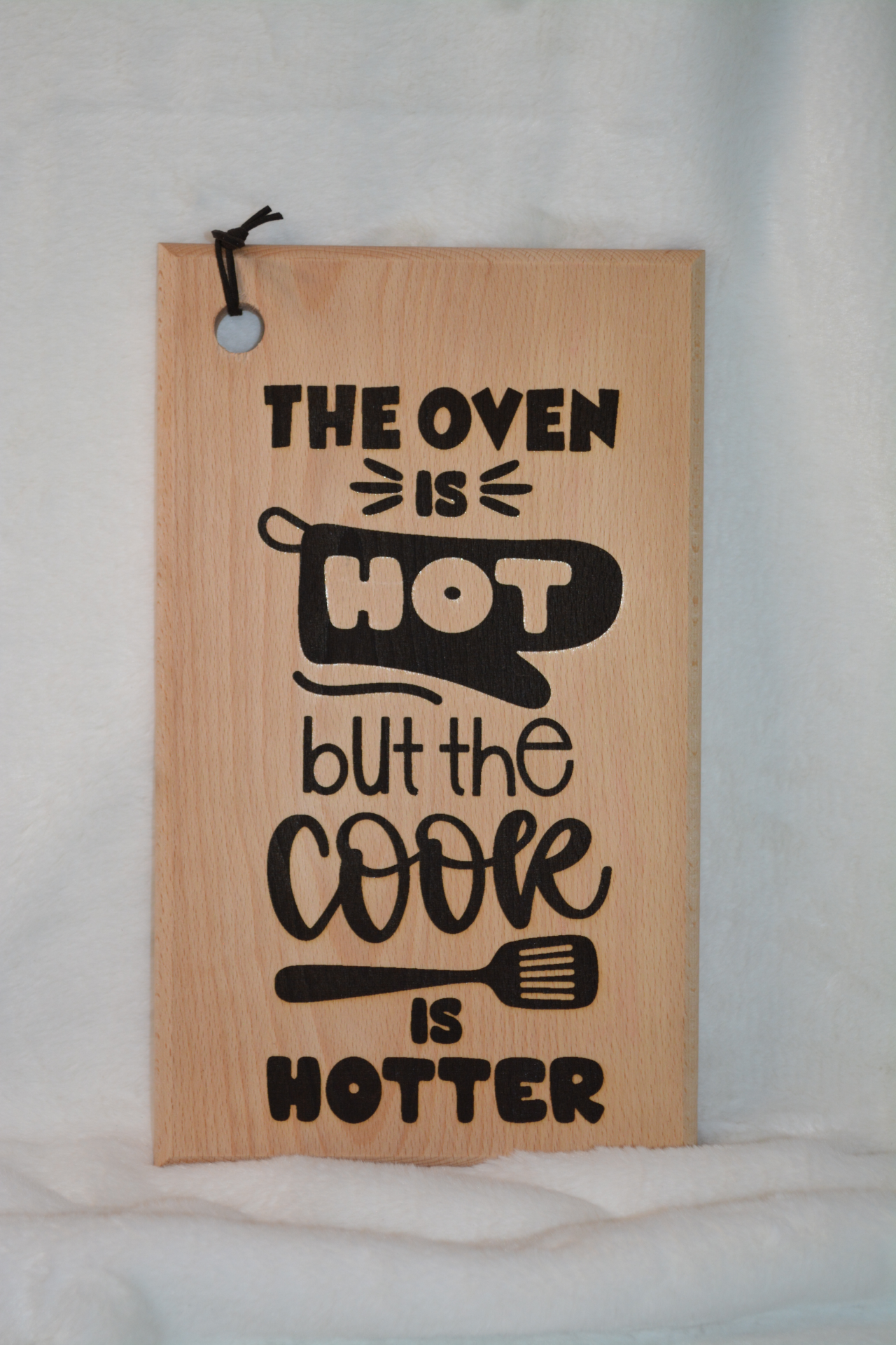 The Oven Is Hot But The Cook Is Hotter - 13.5" x 7.75"